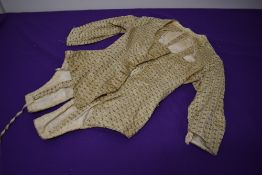A 19th century boned bodice, having beautiful shape with vent to back, unlined, AF, void of