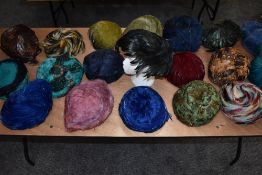 Twenty vintage feather hats, various sizes, eras and styles.