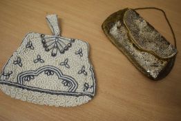 Two 1930s evening bags, one cream with white, pearlescent and silver beading and rhinestones and the