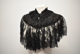 A Victorian black beaded lace capelet.