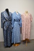Two vintage 1950s/1960s housecoats and a floral cotton nightdress.