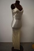 A 1930s/40s cream satin nightdress or slip, having low back and Etam label.