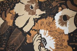 A large piece of vintage 1960s/70s medium weight cotton, having bold floral print in brown hues.