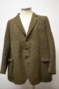A gents 1950s Harris tweed jacket in green, grey and chestnut hues, tailored by Burton.