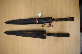 Two vintage oriental paper parasols, AF.