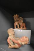 Two erotic terracotta figurines.
