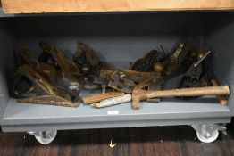 A selection of vintage hand tools, including Record and Stanley planes, rules, hammer etc.