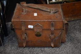 An unusual vintage leather carry case with strap.