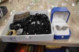 A small selection of costume jewellery including Mourning jewellery silver maple leaf brooch,
