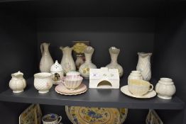 A variety of Irish china, including Beleek vases, cups and saucers, trinket box and more.