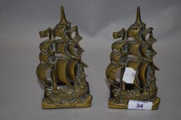 Two vintage brass book ends, of HMS Revenge interest.
