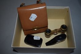 A set of vintage opera glasses, a 19th century lacquered snuff box with metal detailing and