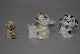 Three vintage novelty dog studies.
