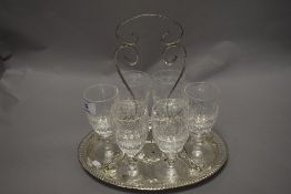 Six Waterford crystal glasses with hammered metal serving tray.