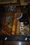 A box of vintage Ethnographlia, including carved bangles, beaded items, shell jewellery and bag