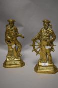Two 1940s Britains pride brass door stops depicting sailors.