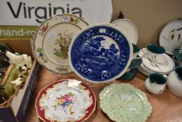 Four vintage plates of differing design, including three Copeland Spode and one Wedgwood with