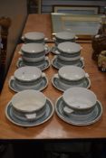 A set of vintage Midwinter soup bowls with plates.