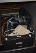 A box of mixed cameras and accessories, including Sank yo and Nikkormat.