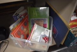 A box of reference books, of stamp, medals and coin interest.