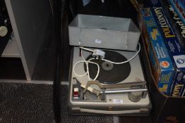A vintage Philips portable record player.