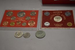 A selection of collectable coins, including Vatican souvenir coins and £S.D system.