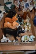 A box of ceramic animal studies, predominantly dog related interest, including novelty items and