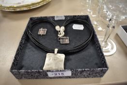 A modern Danon pewter necklace and earring set.