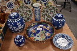 A mixed lot of vintage and modern Chinese and Japanese ceramics, including graduated ginger jars