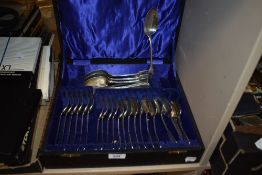 A vintage partial canteen of plated cutlery, monogrammed with the letter E.