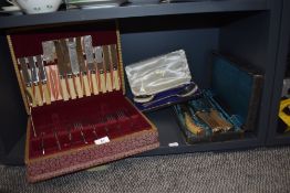 A vintage partial canteen of cutlery, including bone handled knives, some still with original