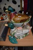 A novelty duck tea pot or jug, a egg basket of duck form and three similar ornaments.