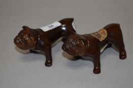 Two vintage ceramic decanters, in the form of Bulldogs, one having original paper label.