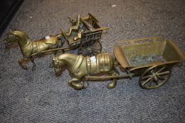Two vintage brass horse and carriages, one including people.