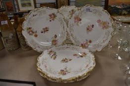 Six Victorian plates, having white ground with scalloped edge heightened with gilt and delicate hand