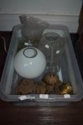 A box of vintage and antique lamp shades, chimneys and brass lamp fittings.