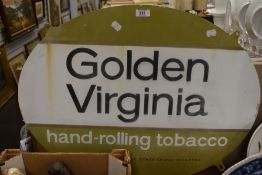 A vintage tin advertising sign for Golden Virginia Tobacco.