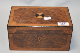 A late 19th/early 20th century burr wood tea caddy, having inlaid detailing (void of internal
