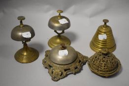 Five antique shop/reception table top service bells, various styles, including ornate filigree