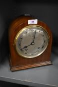 A 1930s Shierwater and Lloyd, Liverpool, mahogany ump backed mantel clock, having roman numerals