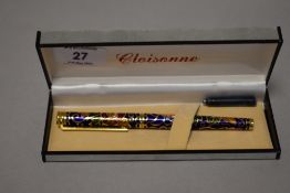 A Cloisonné enamel fountain pen in box.