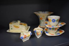 A selection of Art Deco items, to include stylised Crown Ducal cups and saucers, milk jug and