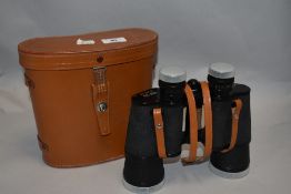 A pair of vintage Zenith binoculars in case.