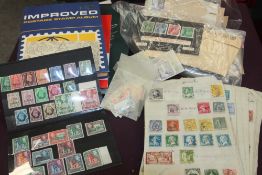 WORLD STAMP COLLECTION IN 2 ALBUMS, ALONG WITH PACKETS, CARDS ETC Couple of world collections in two