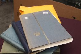 WORLD STAMP COLLECTION IN 3 ALBUMS & FLAT BOX - ALL ERAS, MINT AND USED Three stamp albums one