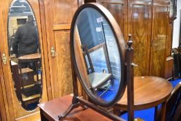 A reproduction oak toilet mirror