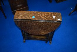 An early 20th Century oak gateleg occasional table
