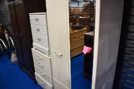 A selection of white laminate bedroom furniture