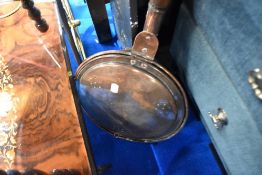 A 19th Century copper warming pan having mahogany handle