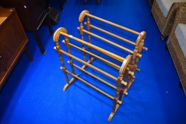 Two traditional beech towel rails